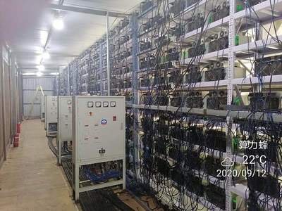 High-tech cryptocurrency mining farm showcasing numerous rigs in operation